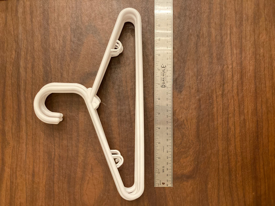 7 plastic hangers white Exc cond and rarely used