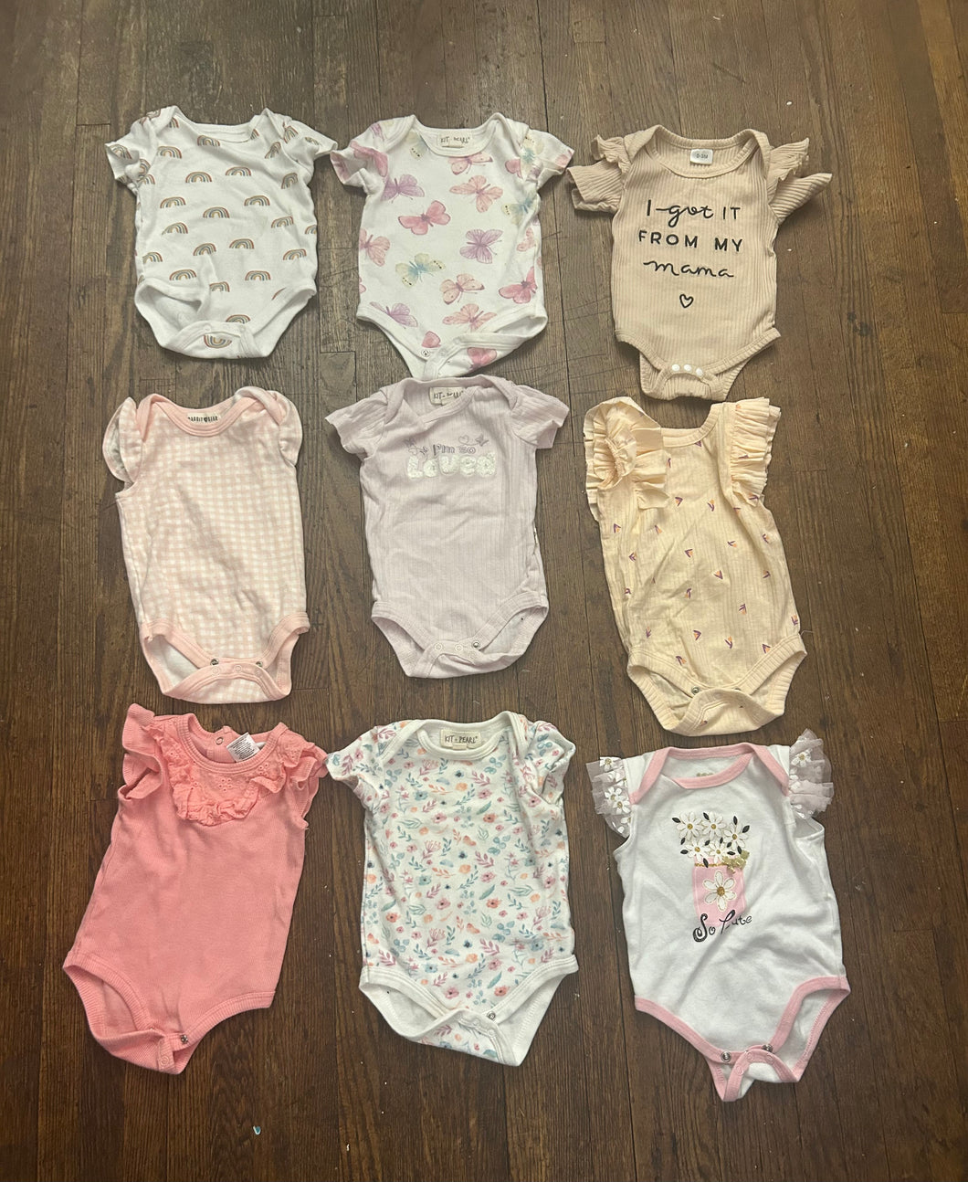 Lot of nine onesies Kit and pearl misc. - size 0-3 Months