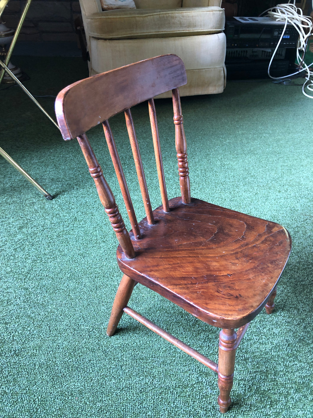 Brown small carved wooden stool