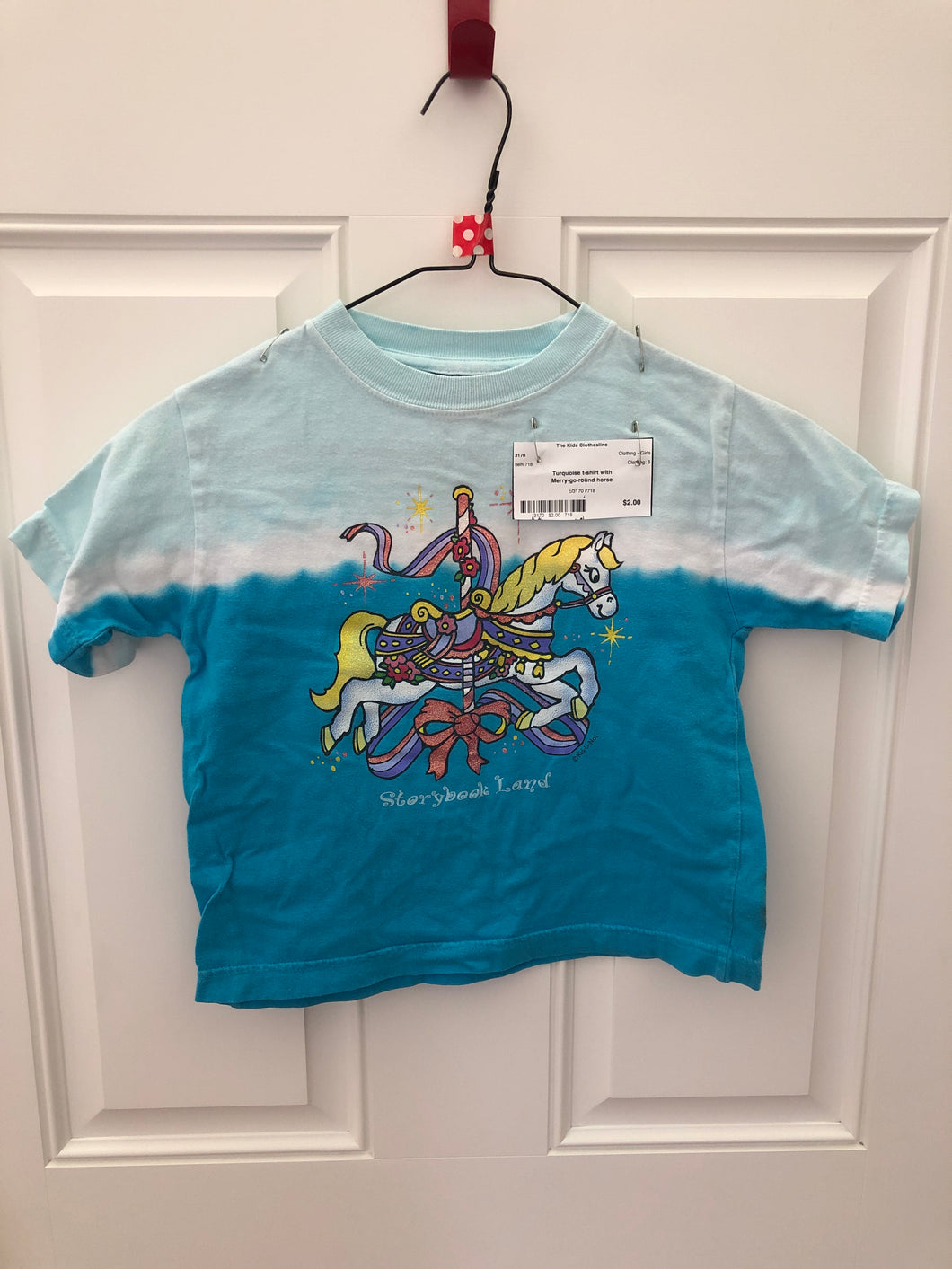 Turquoise t-shirt with Merry-go-round horse - size Kids 6