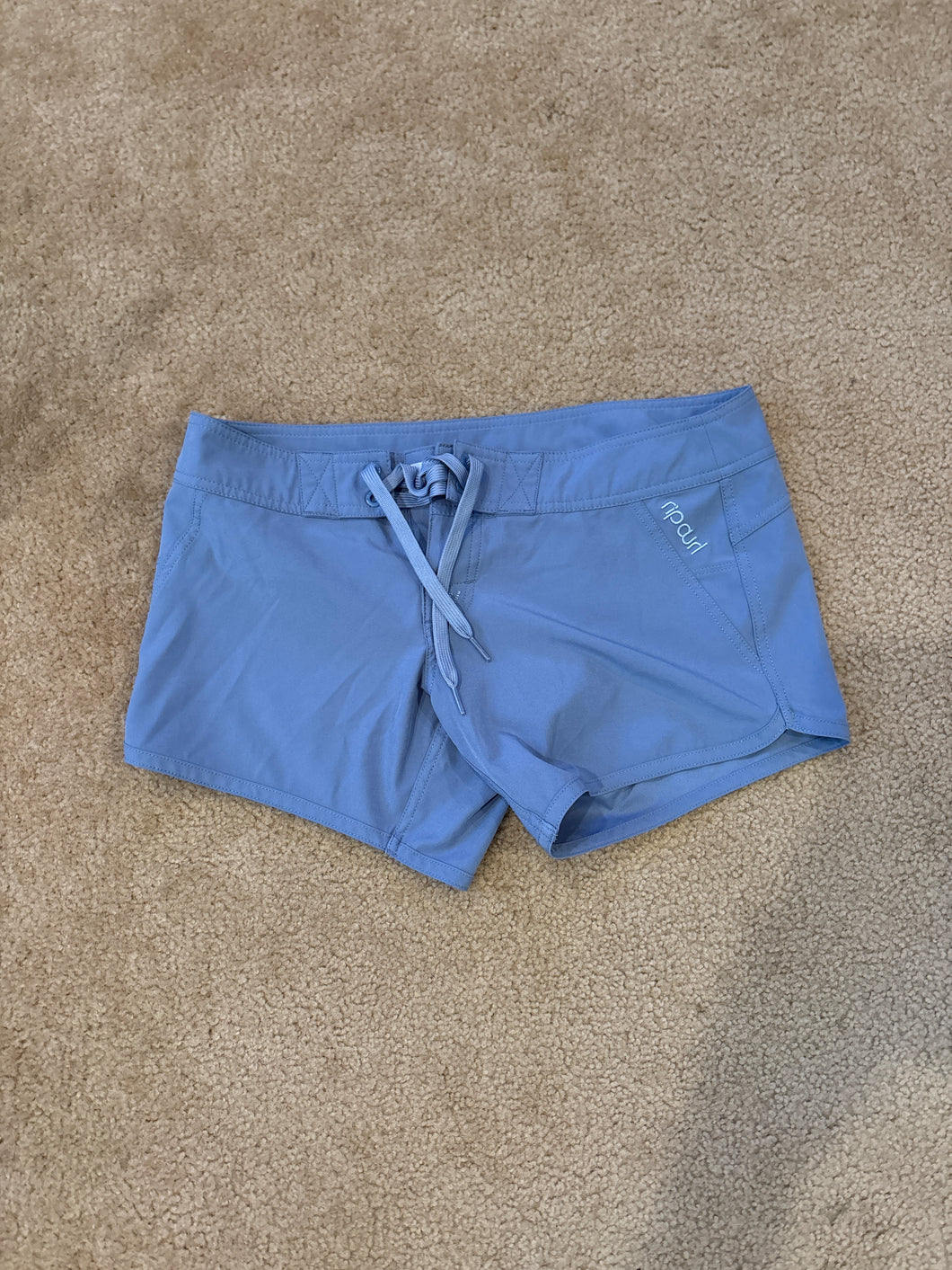 Rip Curl blue surf shorts - size Kids 14