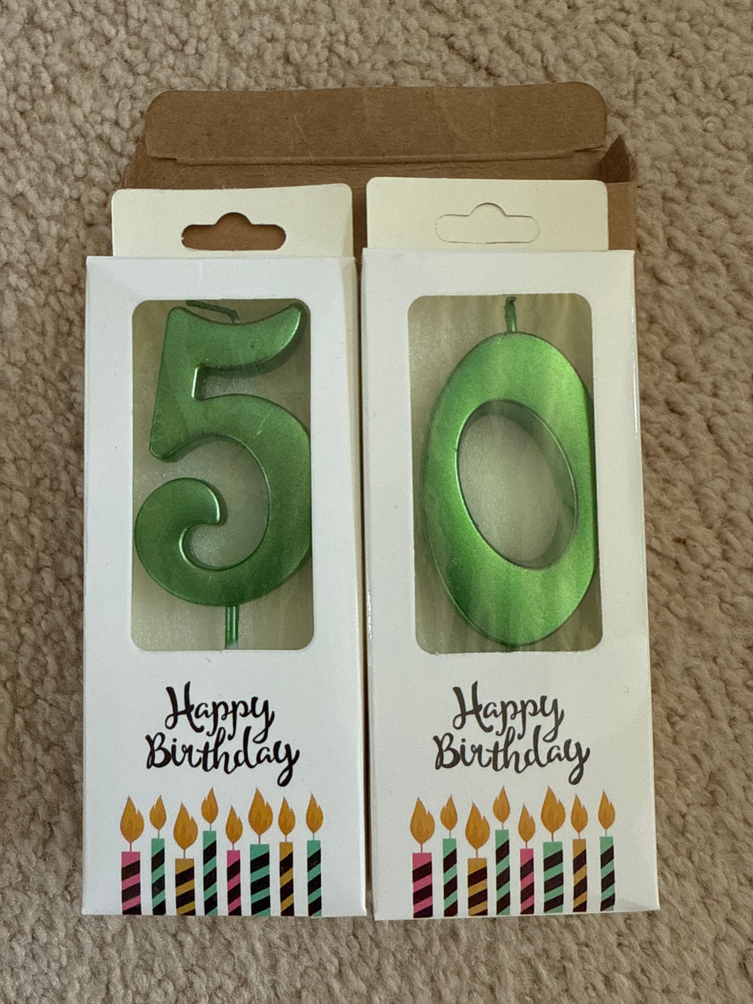 Two green candles 5 and a 0
