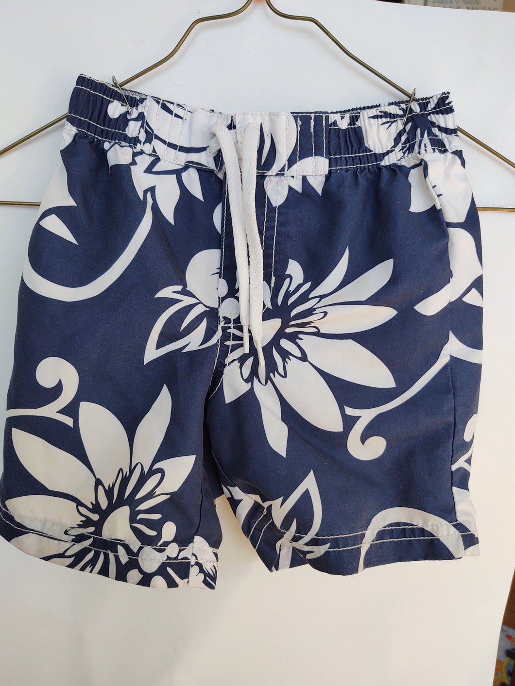 OldNavy swim trunks navy w/wh flowers - size 12-18 Months