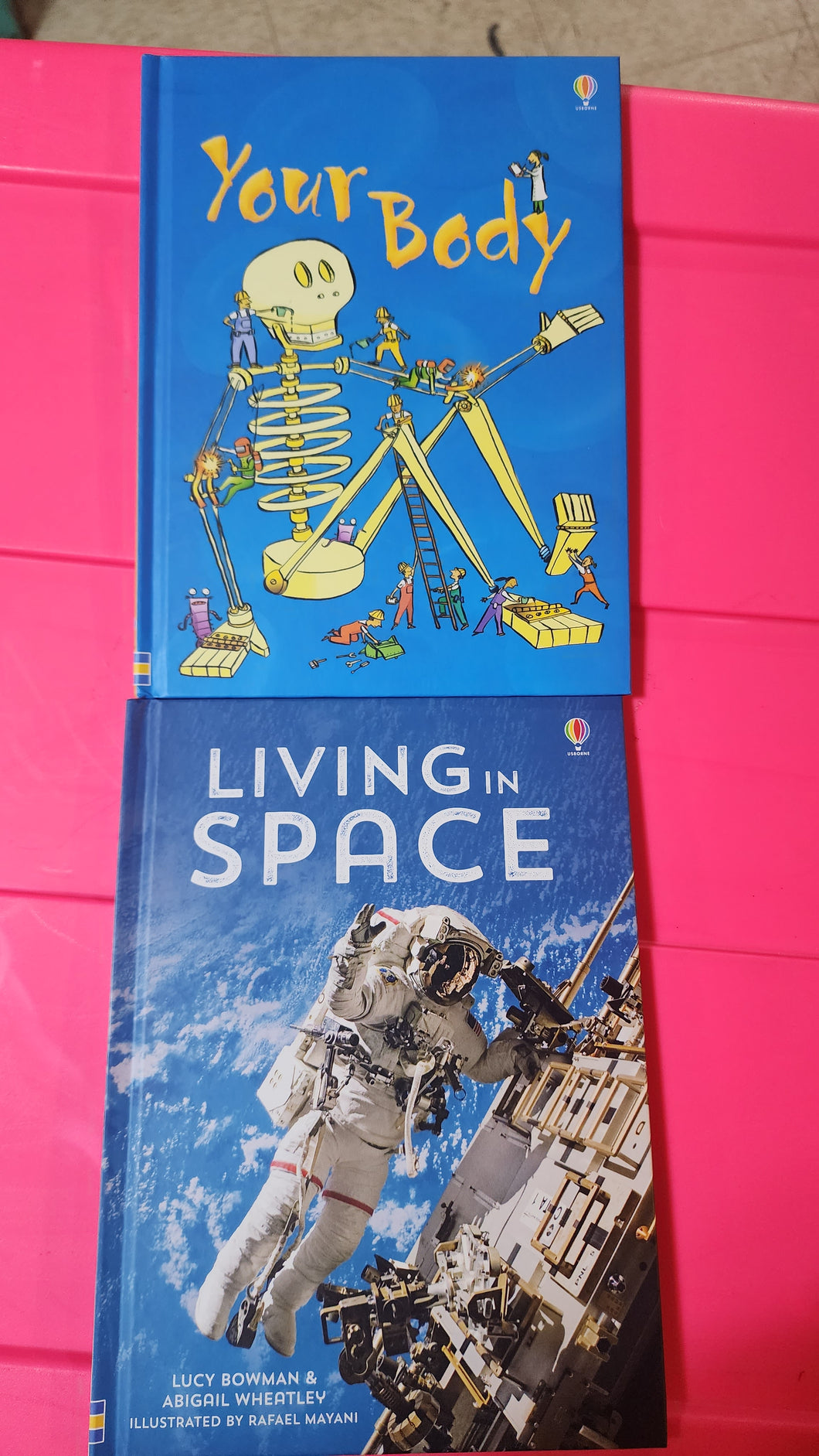 2 new usborne books Your body &