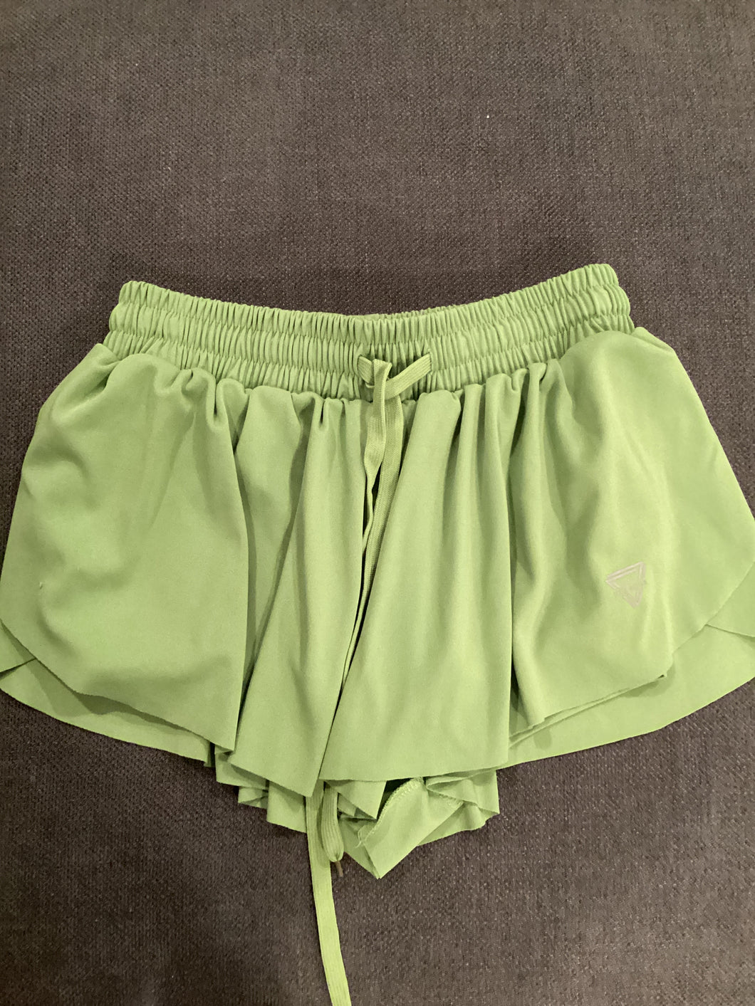 Green shorts - size Junior Girls M (7-9)