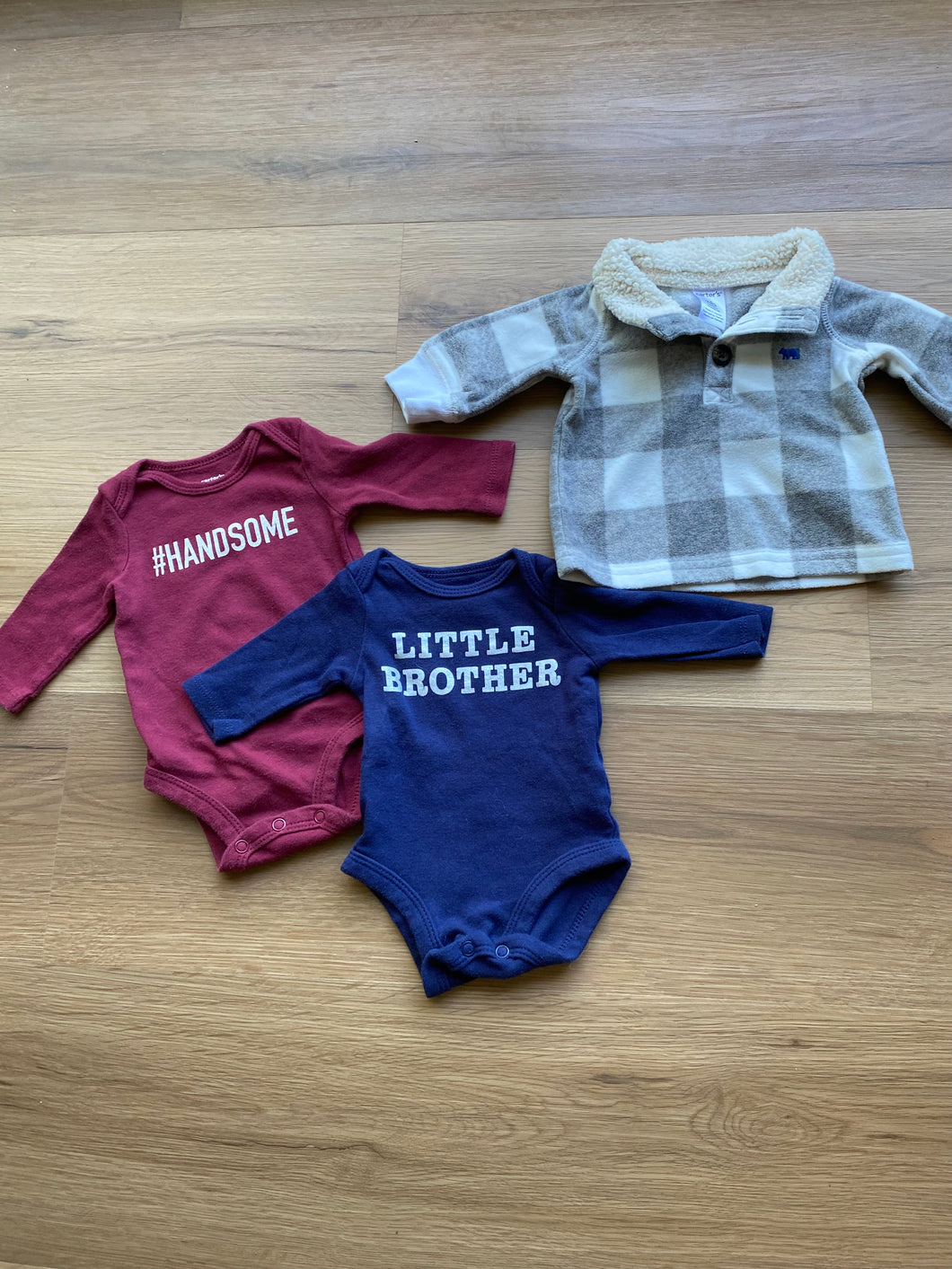 Carter's Onesies - size Newborn