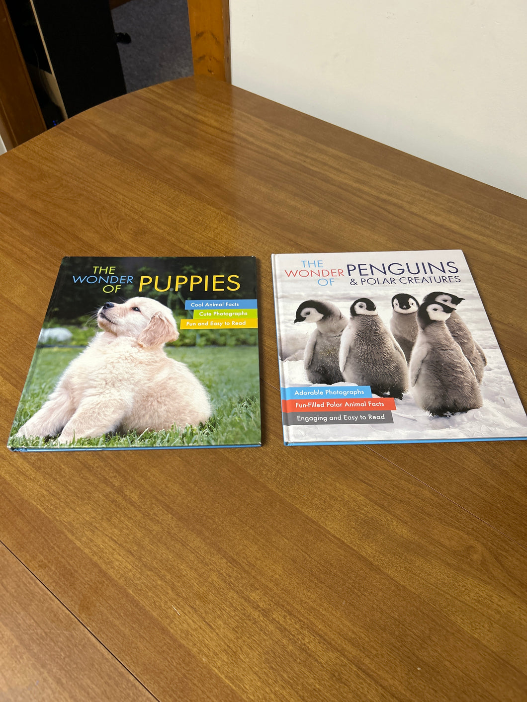 The wonder of books Puppies/penguins