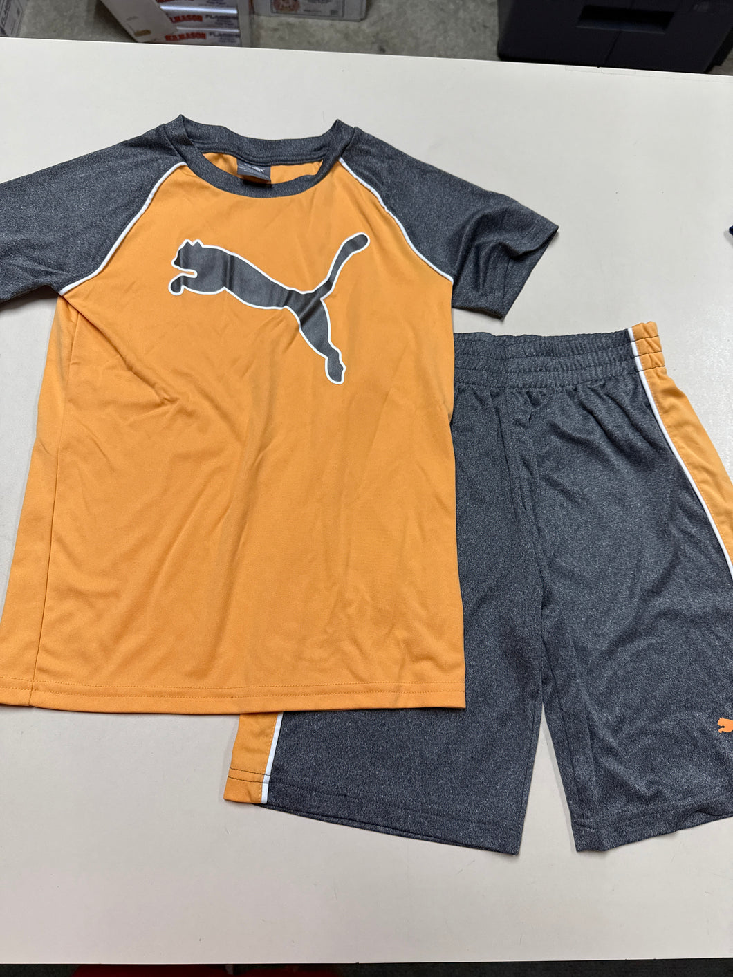 Puma 2 pc short Orange/grey T/shorts - size Kids 7