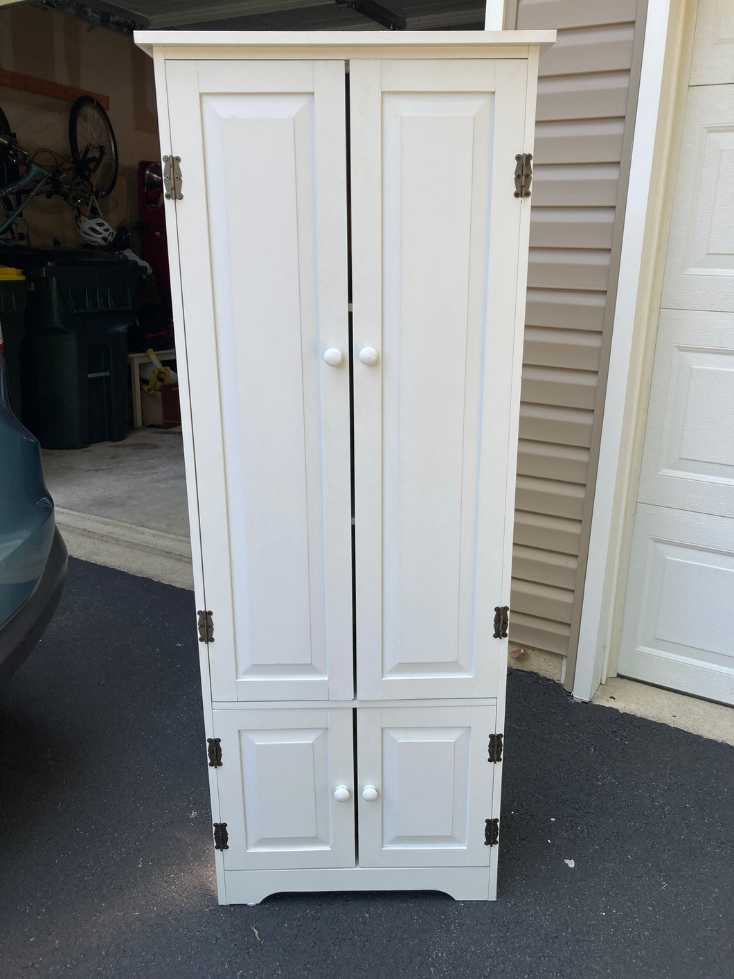 Cabinet White 4 doors ,3 shelves in top part