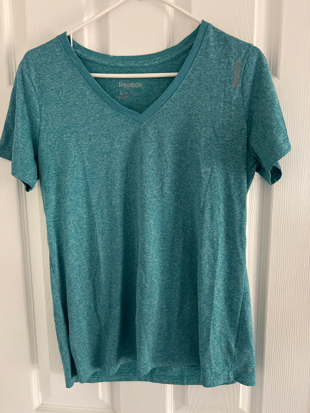 REEBOK SHORT SLV SHIRT TEAL BLUE - V NECK - size Women L (12)