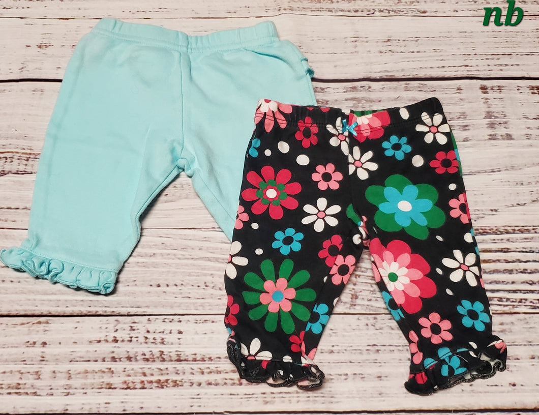 2 pairs of pants flowers and blue - size Newborn