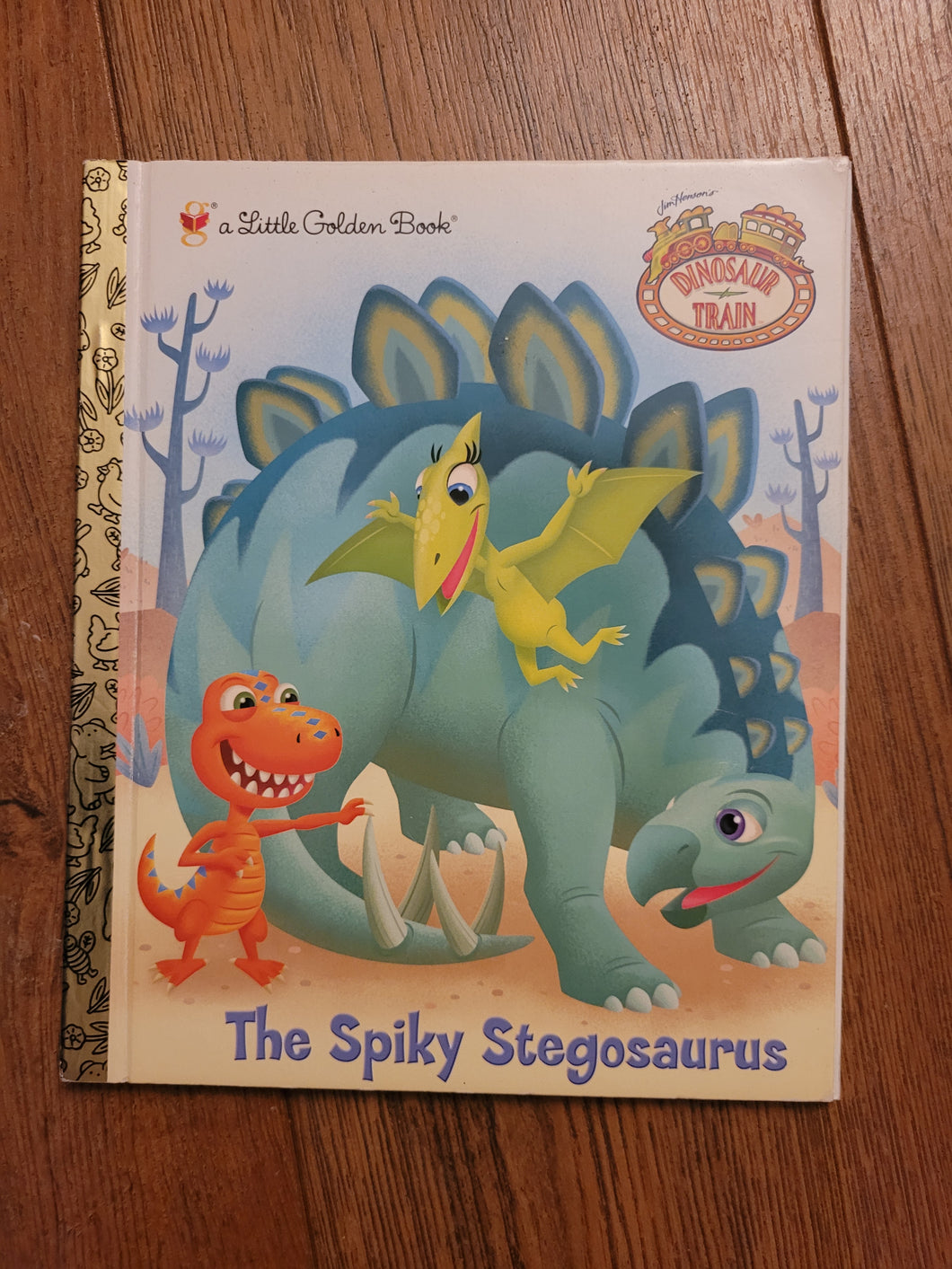 A spiky Stegosaurus Little Golden Book