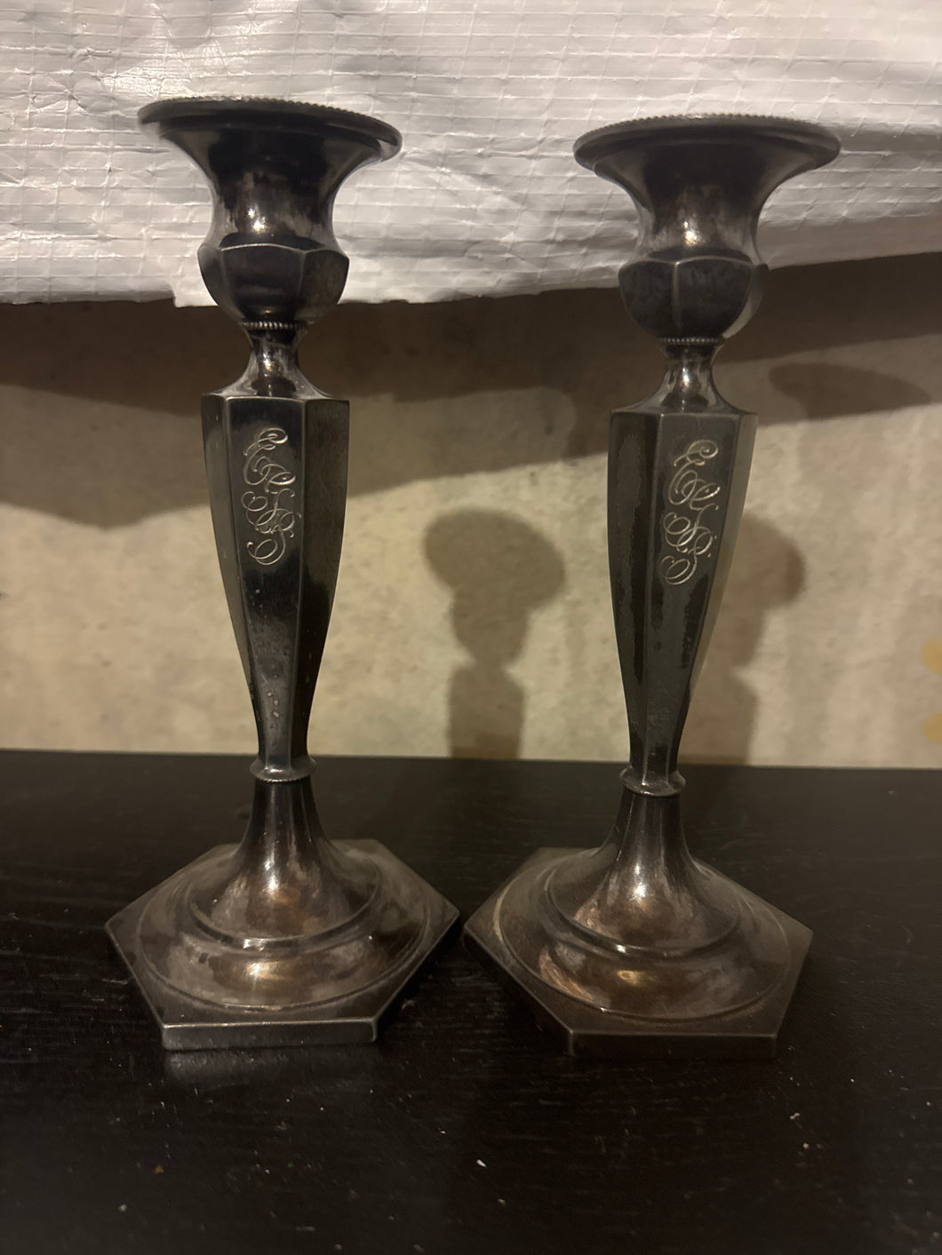 2 tall candle holders Brass