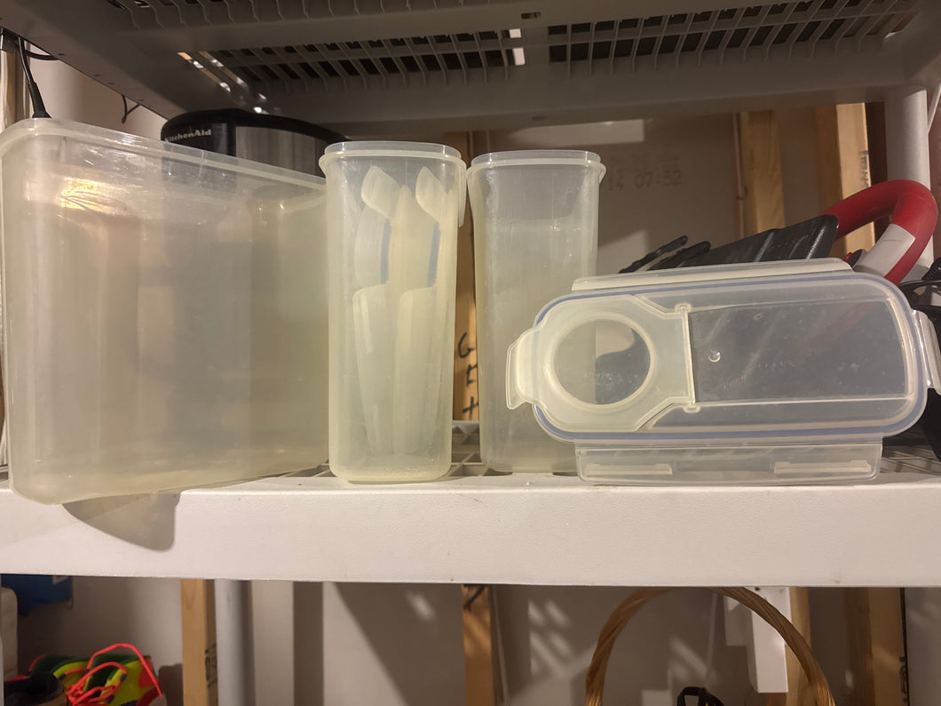 3 plastic bins With lids