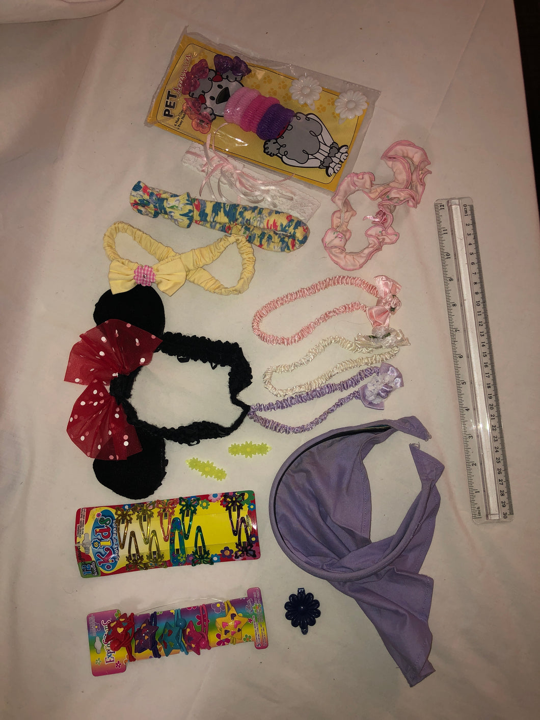 8 headbands, 1 headband bandanna, 15 barrettes,
