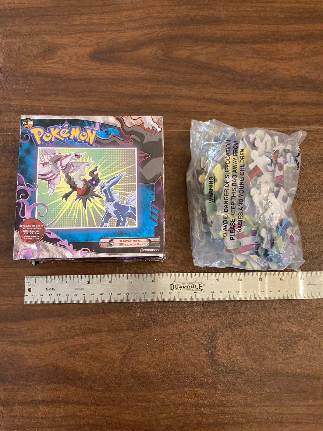 Pokemon 100 pieces NIB Damage/tape on box