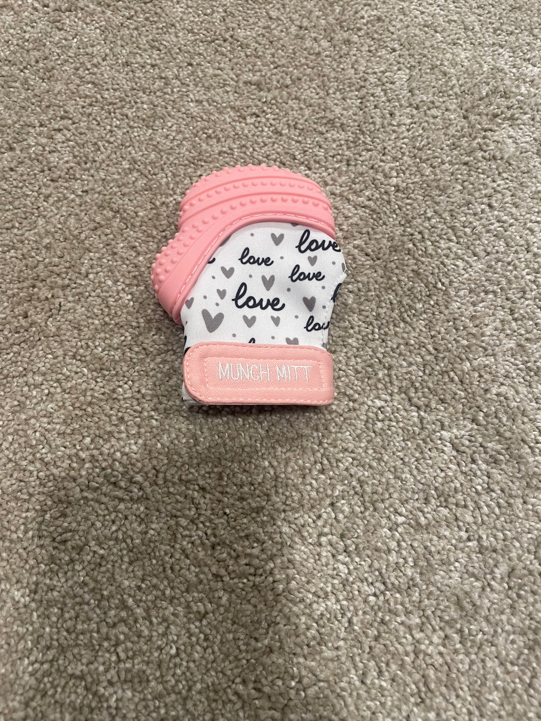 munch mitt pink love teething mitt