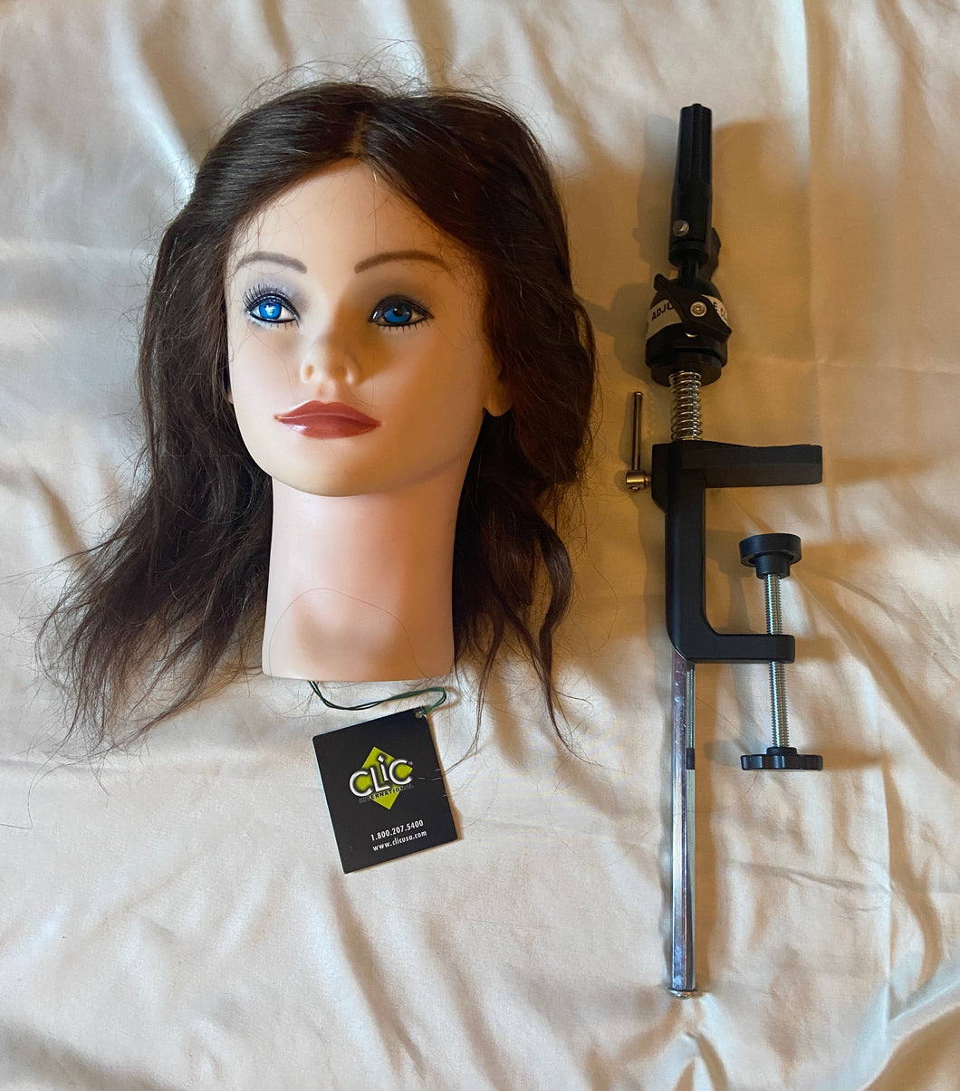 Manikin head and table clamp, Clic brand.