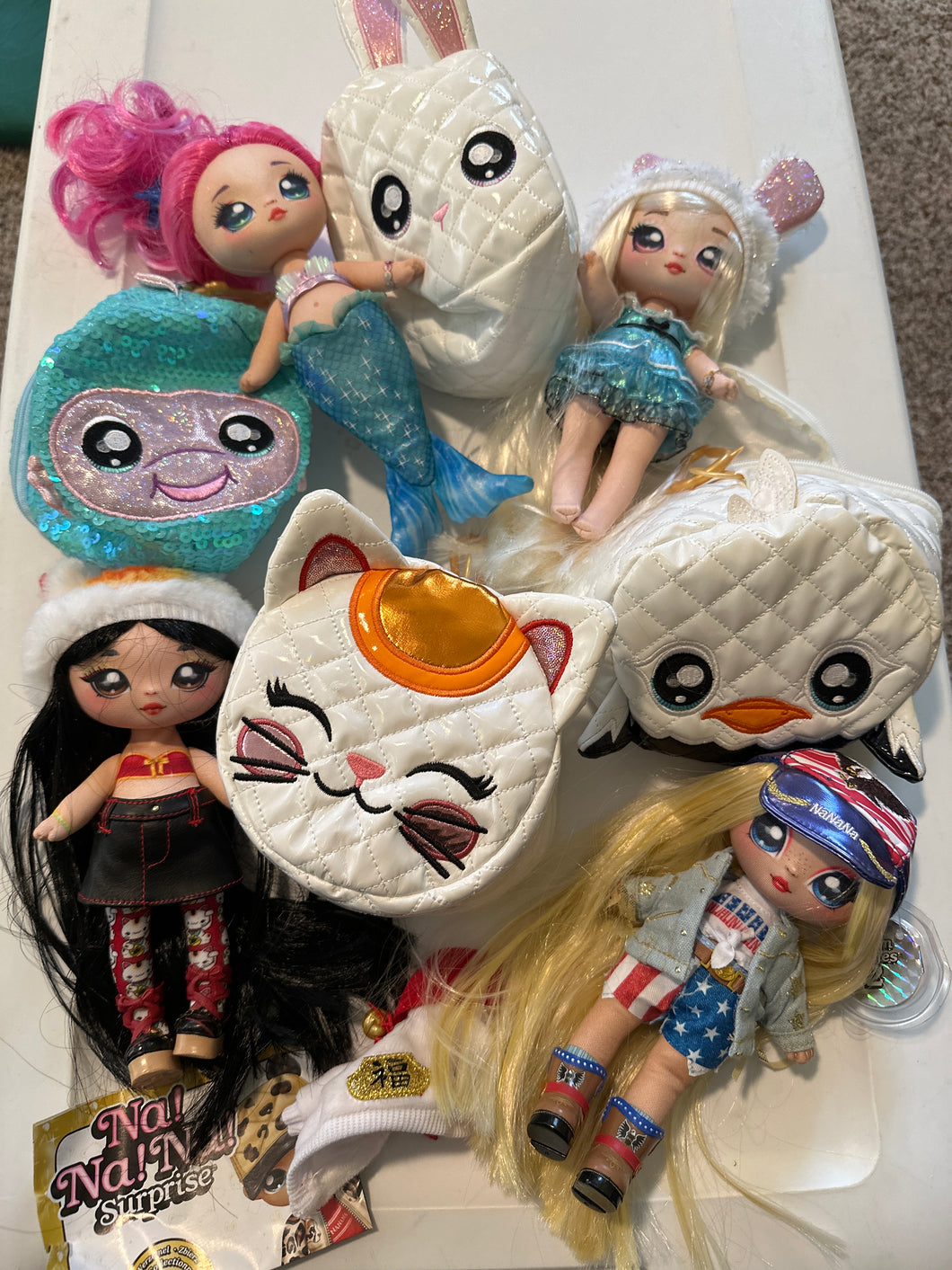 4 NaNa surprise dolls All with bags