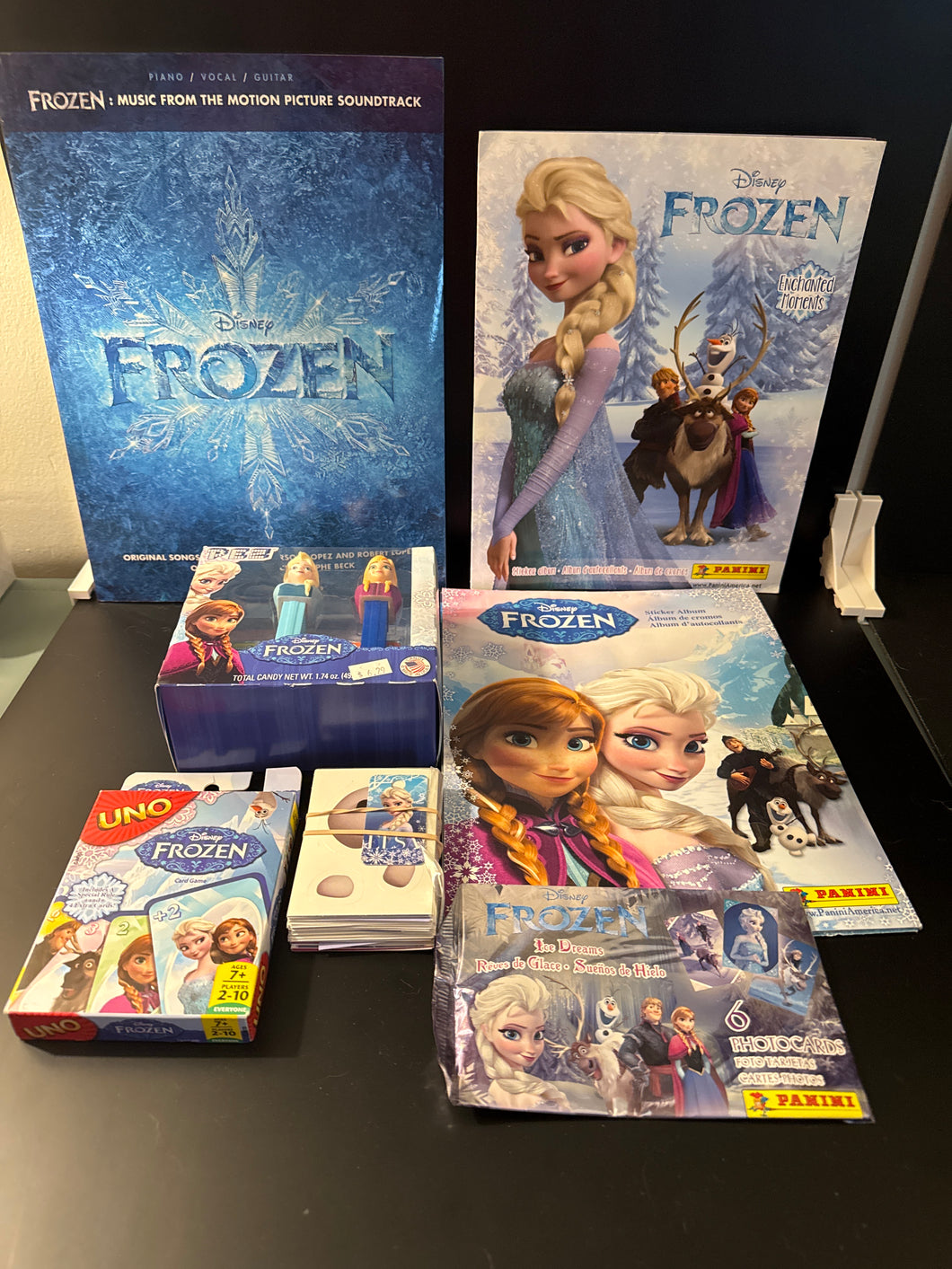 Disney Frozen lot of 7 Sheet music,PEZ,Uno,more