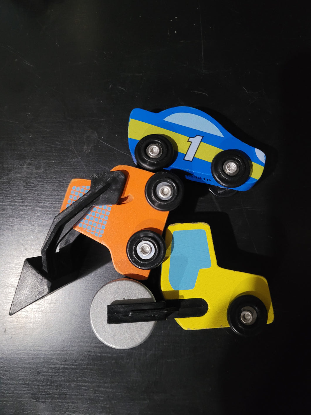 3 wooden vehicles