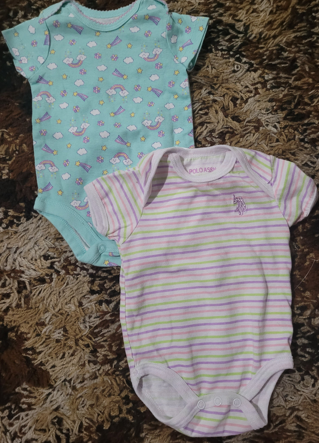 2 oneises Striped  and rainbow - size 0-3 Months