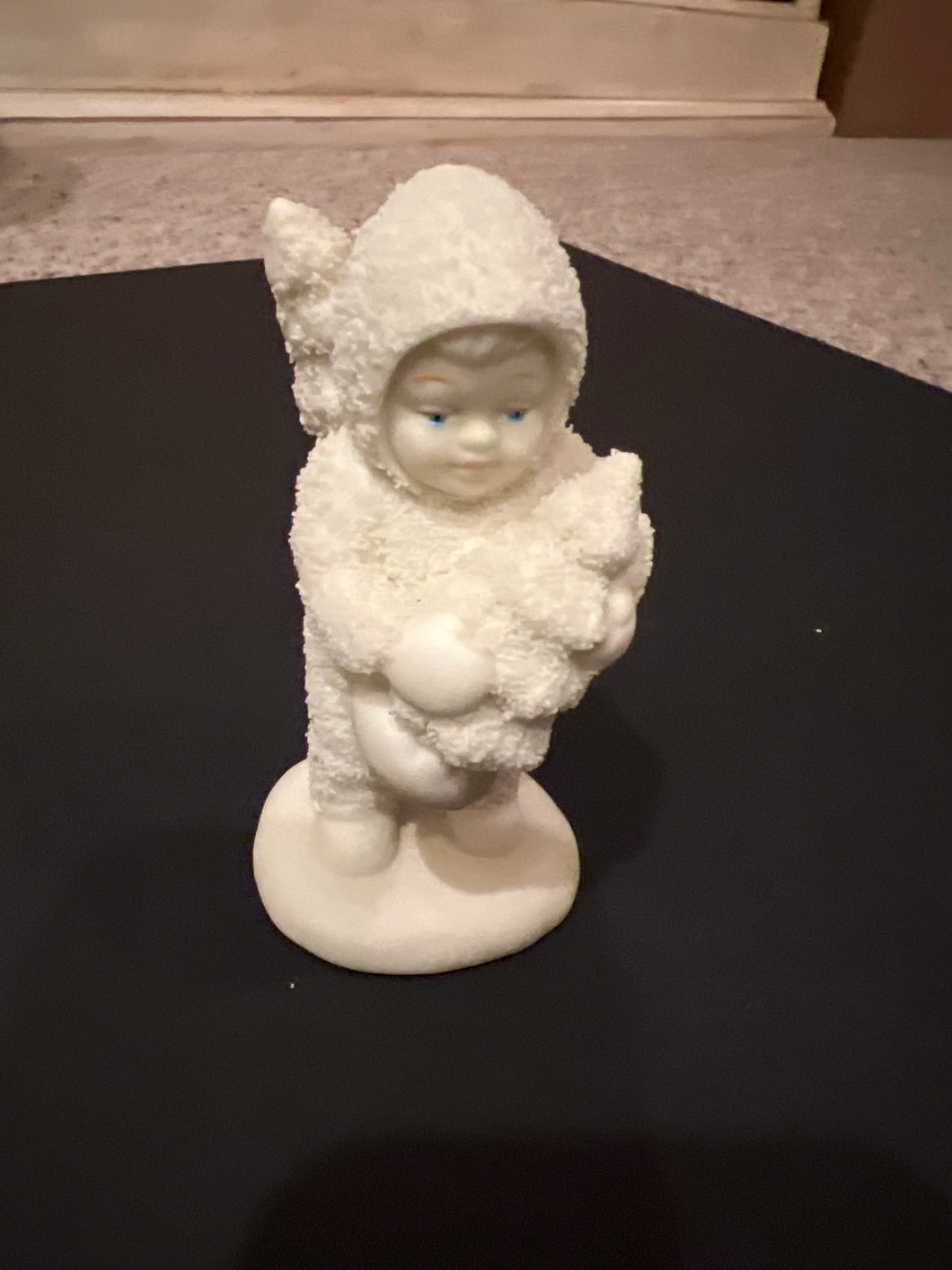 SNOW BABY FIGURINE BABY HOLDING TREE