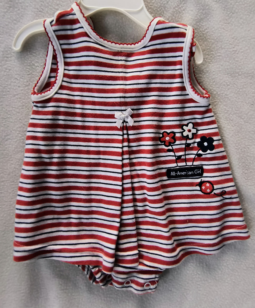 Carter's striped romper red/white/blue - size 6-9 Months
