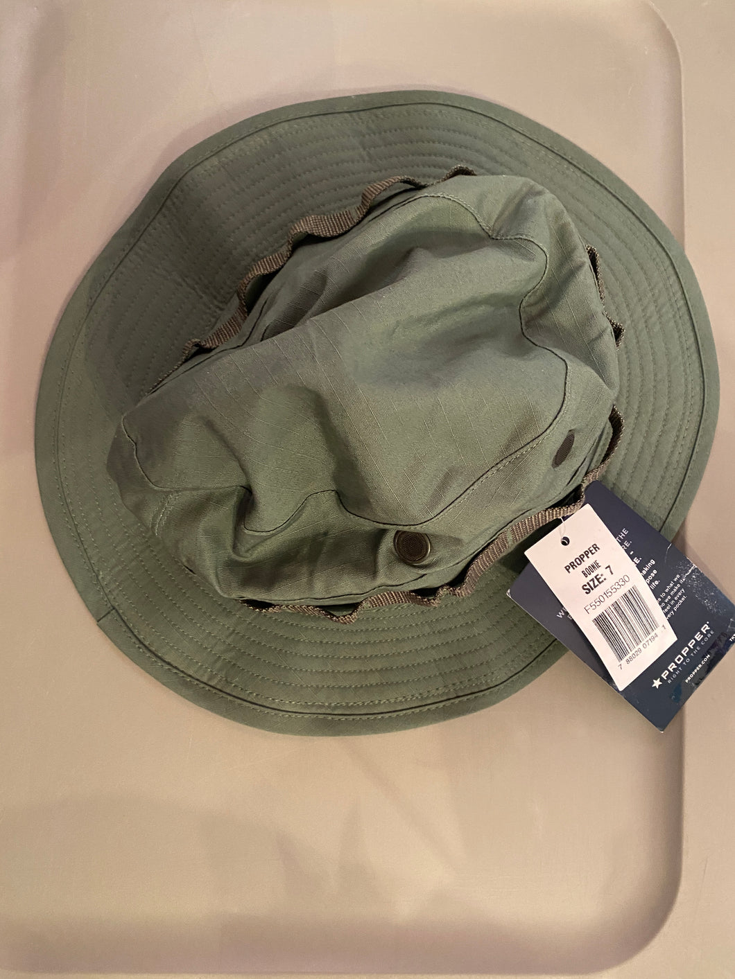 green bucket hat, sz 7 NEW