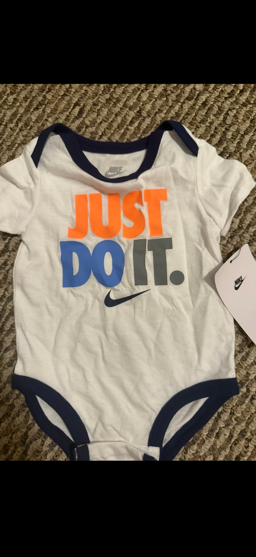 Brand new Nike onsie - size 6 Months