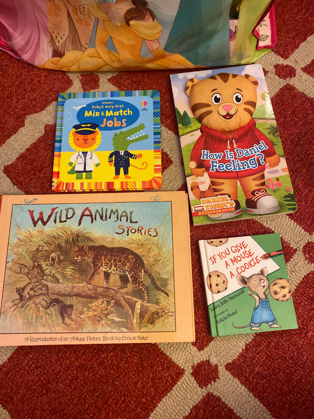 Four books Daniel tiger, usbourne